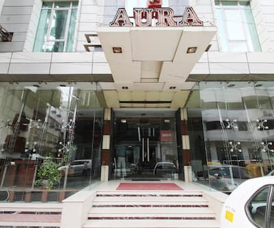 https://imgcld.yatra.com/ytimages/image/upload/t_hotel_yatra_city_desktop/v1407931338/Domestic Hotels/Hotels_New Delhi/Hotel Aura/Exterior_1_copy.jpg